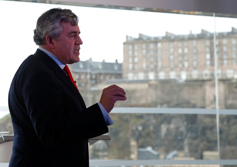 © Reuters.  Gordon Brown gestures as he delivers his speech on powers for the Scottish Parliament, in Edinburgh