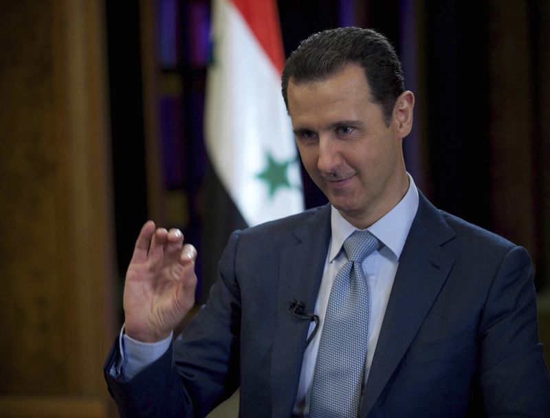 © Reuters. Syria's President Bashar al-Assad is seen during the filming of an interview with the BBC, in Damascus