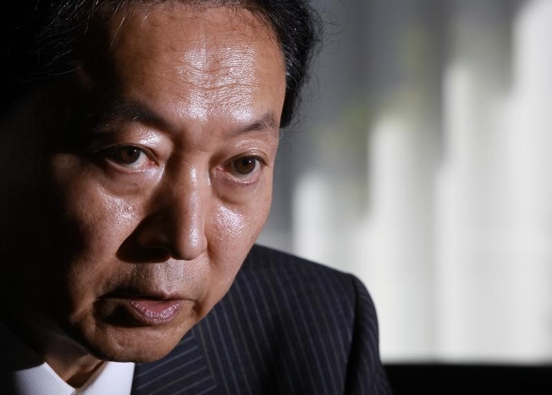 © Reuters. Japan's former Prime Minister Hatoyama speaks during an interview with Reuters at his office in Tokyo