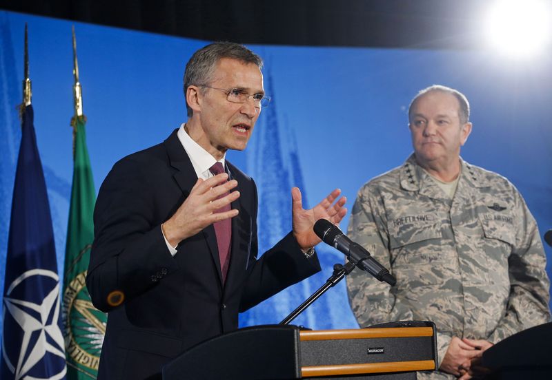 © Reuters. NATO Secretary General Stoltenberg and Supreme Allied Commander Europe General Breedlove hold a joint news conference at the SHAPE in Mons