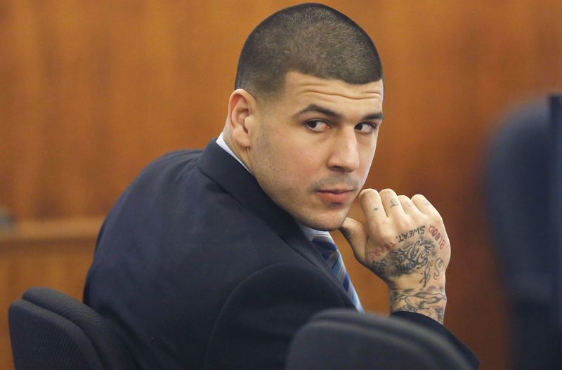 © Reuters. Former New England Patriots player Aaron Hernandez sits during his murder trial at the Bristol County Superior Court in Fall River