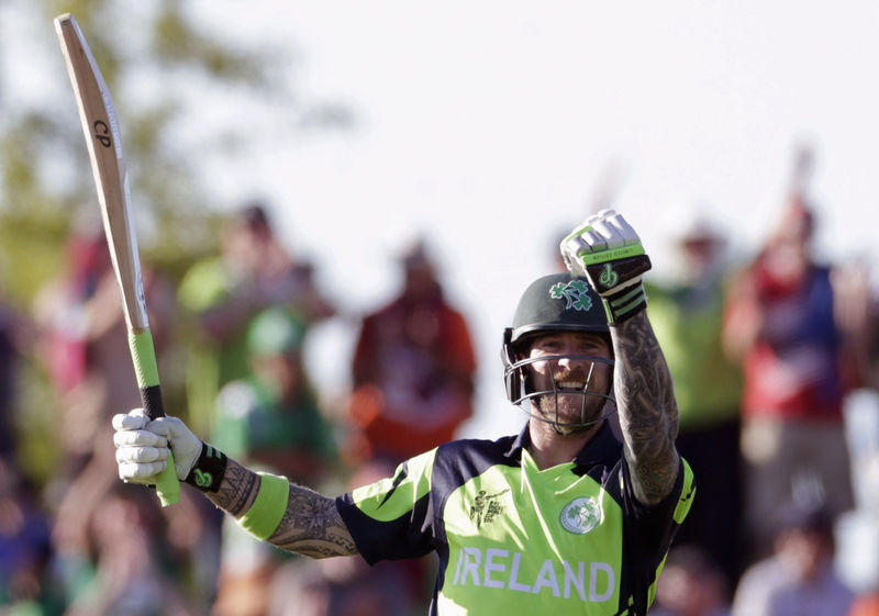 © Reuters. Ireland's Mooney celebrates hitting the winning runs as they beat the West Indies for the first time in their Cricket World Cup match in Nelson