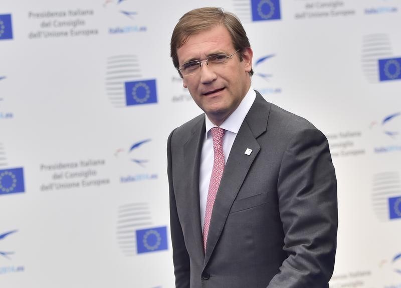 © Reuters. Portugal's PM Pedro Passos Coelho arrives for a conference on jobs in Milan