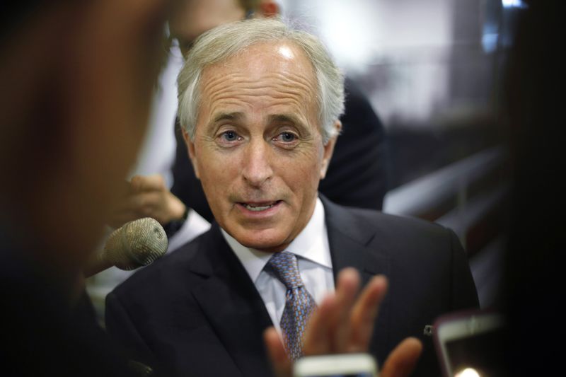 © Reuters. Corker talks to reporters as he arrives for the weekly Republican caucus policy luncheons at the U.S. Capitol in Washington