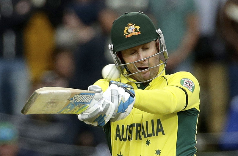 © Reuters. Australia's Michael Clarke is hit by the ball after mistiming a pull shot from the bowling of Scotland's Josh Davey during their Cricket World Cup match at the Bellerive Oval in Hobart