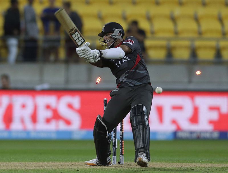 © Reuters. United Arab Emirates' captain Mohammad Tauqir is bowled by South Africa's Dale Steyn during their Cricket World Cup match in Wellington