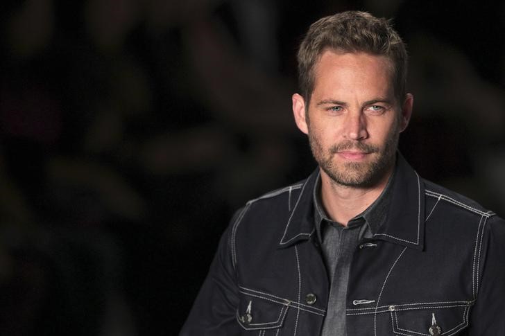 © Reuters. Paul Walker durante desfile em São Paulo, em foto de arquivo