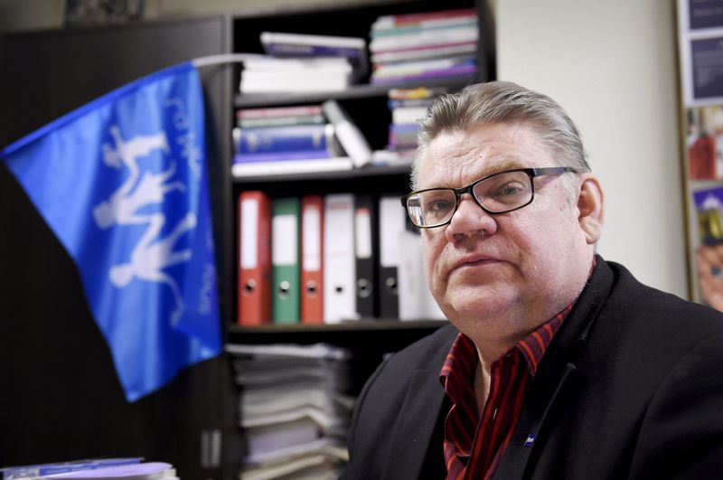 © Reuters. Chairman Soini of the Finns Party looks on during an interview in his study at the Finnish Parliament in Helsinki