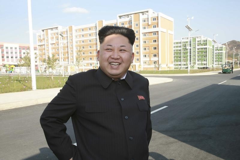 © Reuters. North Korean leader Kim Jong Un gives field guidance to the newly built Wisong Scientists Residential District in this undated photo released by KCNA