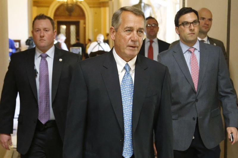 © Reuters. Boehner returns to his office after a visit to the House floor for procedural votes for legislation to fund the Department of Homeland Security at the Capitol in Washington