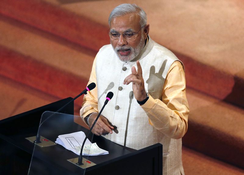 © Reuters. India's Prime Minister Narendra Modi addresses Sri Lanka's parliament in Colombo