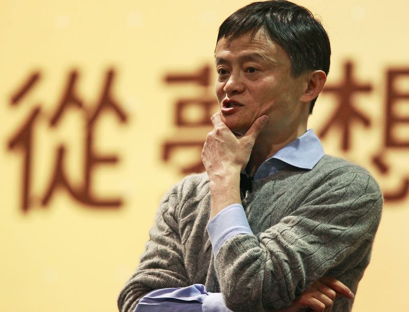 © Reuters. Alibaba Group Executive Chairman Ma reacts while giving a speech at National Taiwan University in Taipei