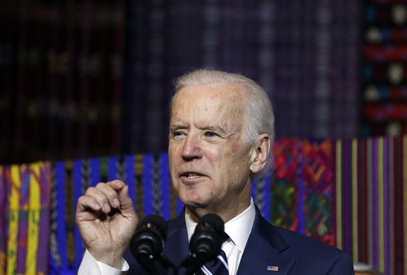 © Reuters. U.S. Vice President Joe Biden speaks during his visit to the Ixchel Museum in Guatemala City