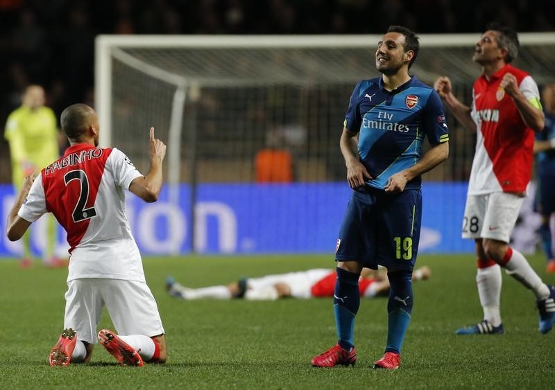 © Reuters. Jogadores do Mônaco comemoram classificação 