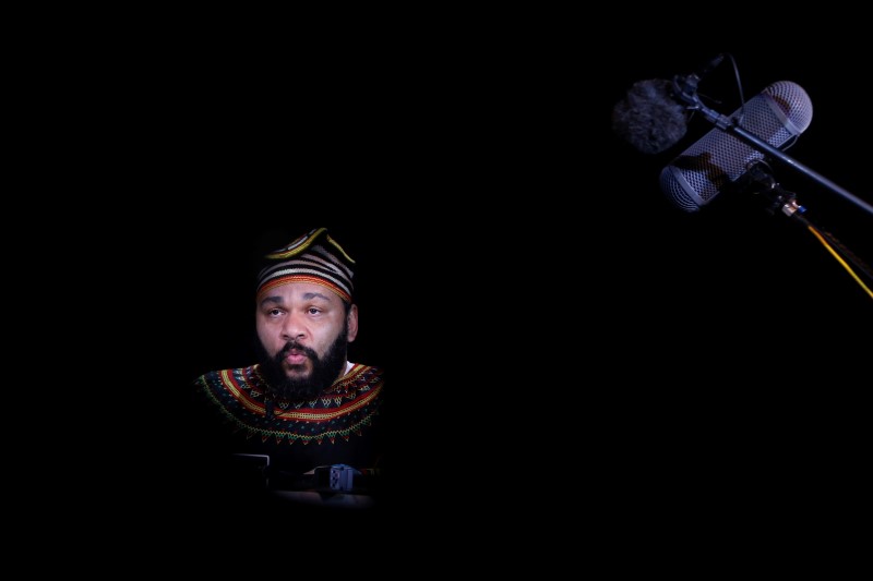 © Reuters. French comedian Dieudonne attends a news conference at the "Theatre de la Main d'or" in Paris