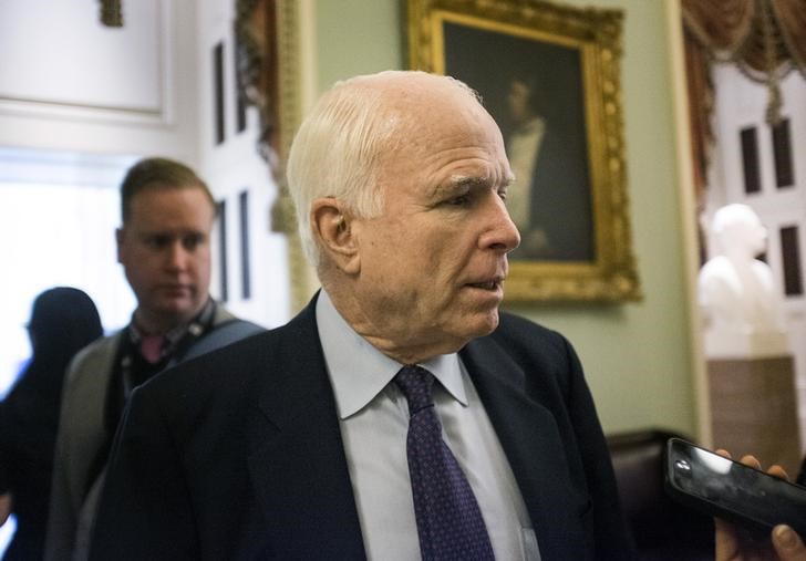© Reuters. Chairman of the Armed Forces Committee Senator John McCain speaks to reporters on Capitol Hill in Washington