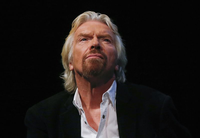 © Reuters. File photo of Sir Richard Branson listening to a speaker at the Global Commission on Drug Policy in New York