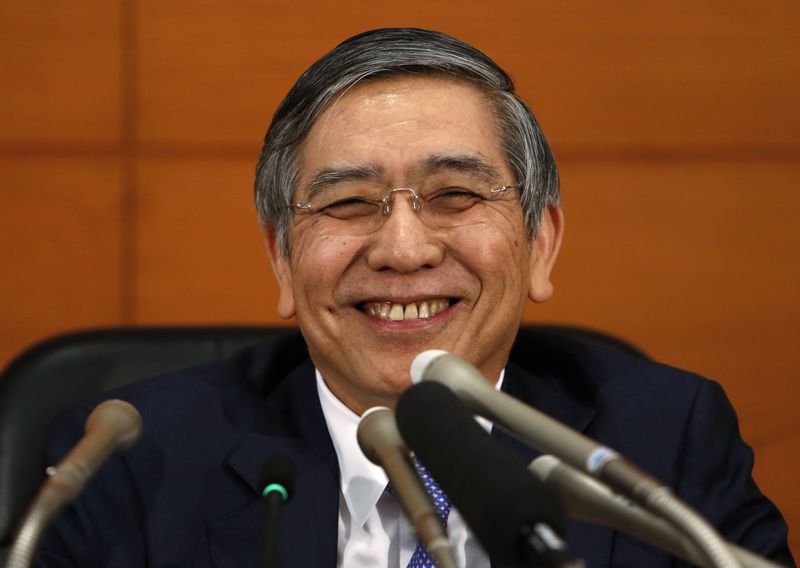 © Reuters. Bank of Japan Governor Kuroda smiles during a news conference at the BOJ headquarters in Tokyo