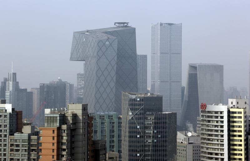 © Reuters. China Central Television Headquarters and other office buildings are pictured in Beijing's central business district