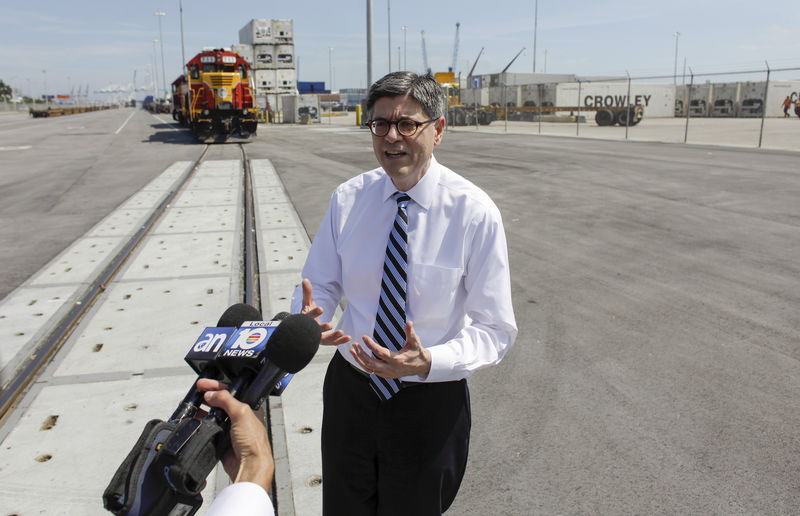 © Reuters. U.S. Treasury Secretary Jack Lew speaks with journalists during a tour at the Port Miami on-dock rail facilities in Miami
