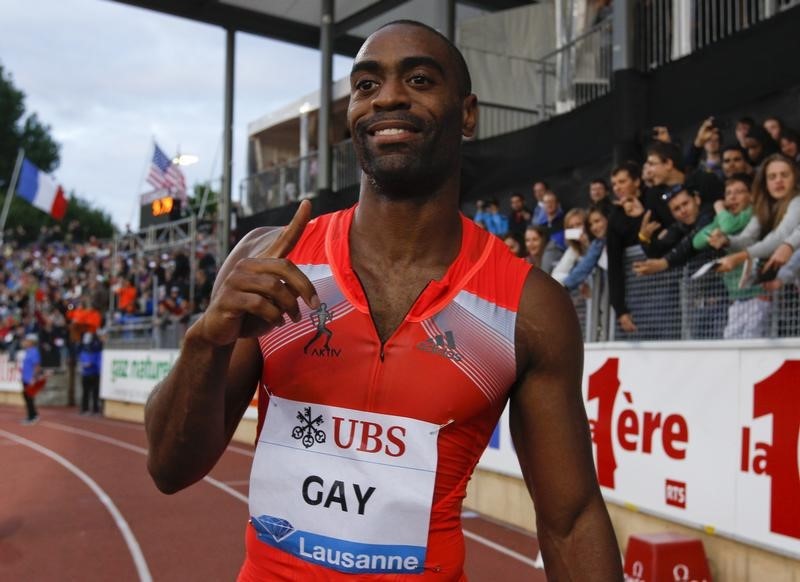 © Reuters. Gay of the U.S. gestures after winning in the 100m event of the Lausanne Diamond League meeting in Lausanne