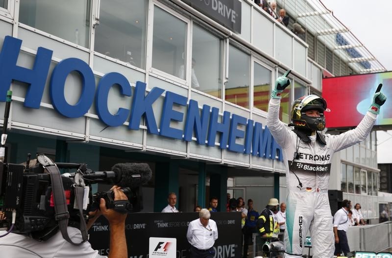 © Reuters. Mercedes Formula One driver Rosberg celebrates winning German F1 Grand Prix at Hockenheim 