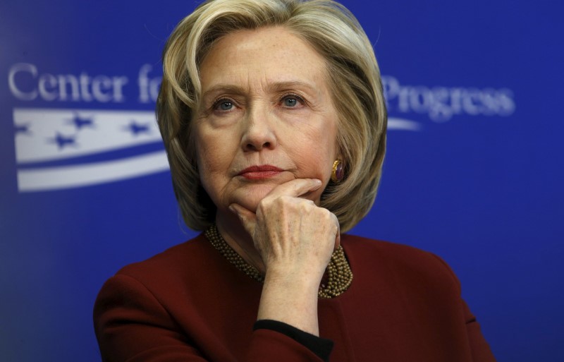 © Reuters. Clinton listens to remarks as she takes part in a Center for American Progress roundtable discussion on "Expanding Opportunities in America's Urban Areas" in Washington