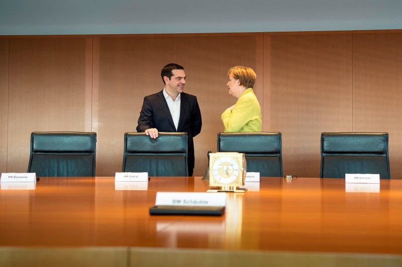 © Reuters. UN TON APAISÉ POUR LA PREMIÈRE VISITE D'ALEXIS TSIPRAS À BERLIN