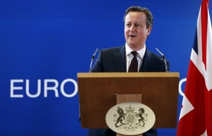 © Reuters. Britain's PM Cameron addresses a news conference during a EU leaders summit in Brussels