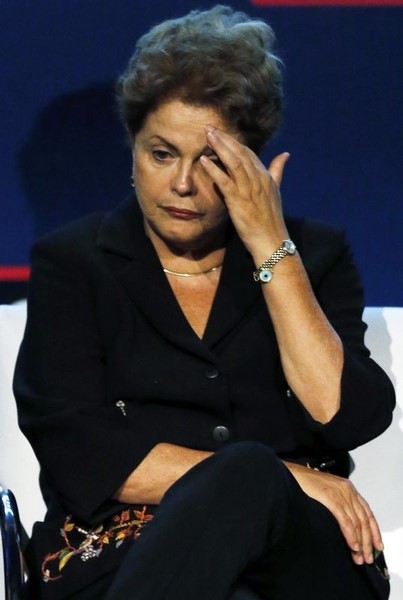© Reuters. Brazil's President Dilma Rousseff reacts as she attends the opening ceremony of the International Construction Fair in Sao Paulo