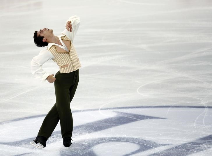 © Reuters. Javier Fernandez of Spain performs during the men's free skating event at the ISU Grand Prix of Figure Skating final in Barcelona