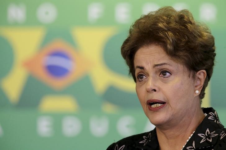 © Reuters. Brazil's President Dilma Rousseff reacts during a ceremony to announce measures to modernize Brazilian soccer at the Planalto Palace in Brasilia 