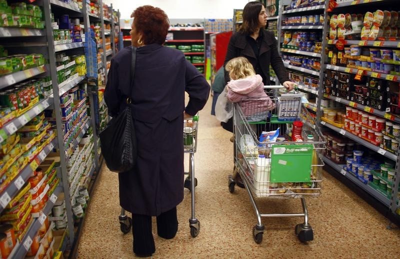 © Reuters. File photo of people shopping for groceries at an Asda store in High Wycombe