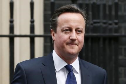 © Reuters. Britain's Prime Minister Cameron leaves 10 Downing Street in London