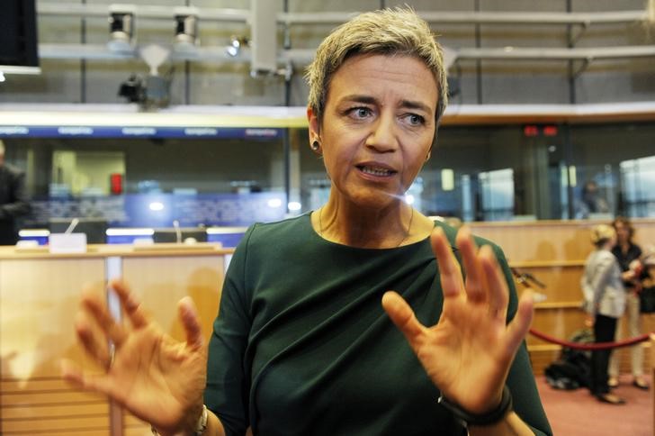 © Reuters. Competition European Commissioner-designate Vestager of Denmark gestures prior to an address to the European Parliament's Committee on Economic and Monetary Affairs, at the EU Parliament in Brussels