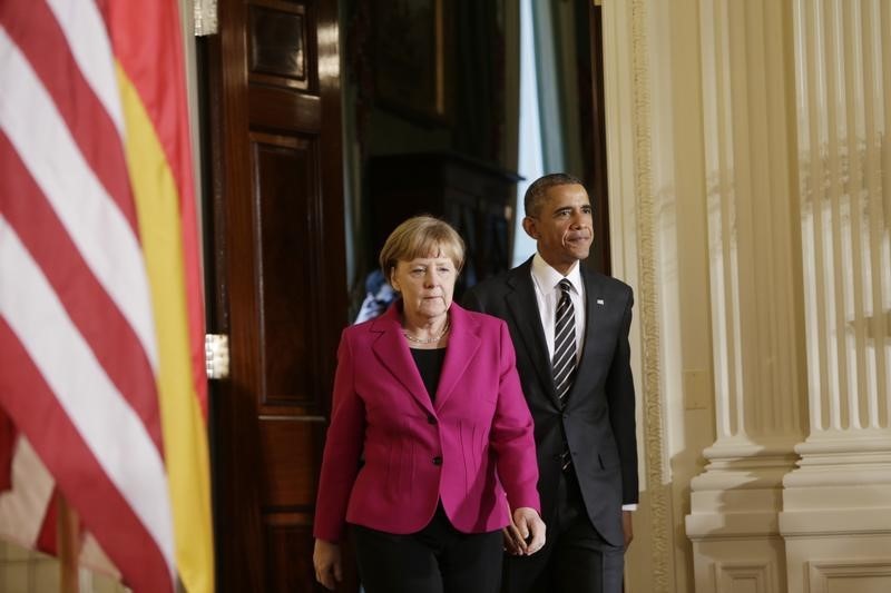 © Reuters. البيت الأبيض: أوباما وميركل يناقشان المحادثات النووية الإيرانية