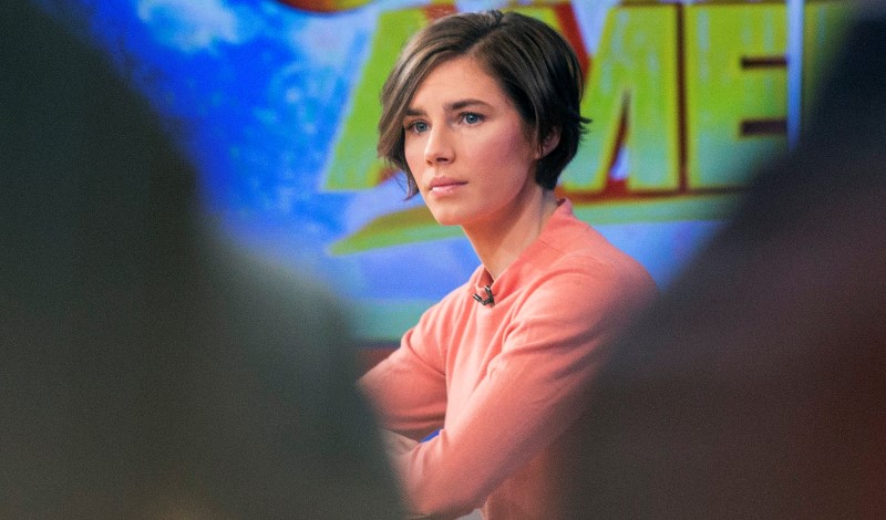 © Reuters. File photo of Amanda Knox reacting during her interview on ABC's "Good Morning America" in New York