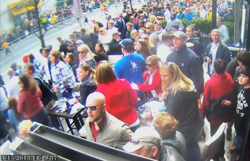 © Reuters. A still image captured from surveillance video at the Boston Marathon shows the scene moments before a second bomb exploded near the finish line of the race