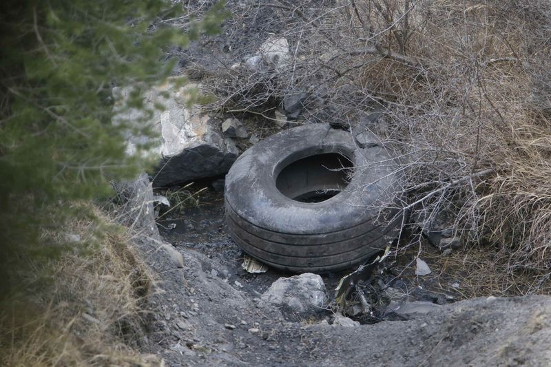 © Reuters. Debris from the Germanwings Airbus A320 is seen at the site of the crash, near Seyne-les-Alpes, French Alps