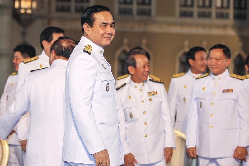 © Reuters. Thailand's Prime Minister Prayuth smiles after a photo session at Government House in Bangkok