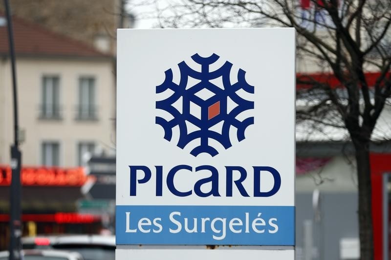 © Reuters. LE SUISSE ARYZTA VA PRENDRE 49% DE PICARD