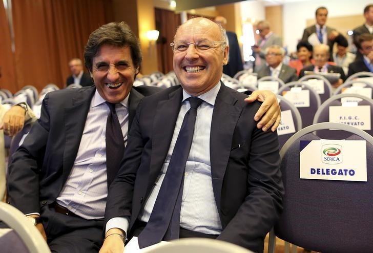 © Reuters. Juventus Sporting Director Marotta and Torino president Cairo smile as they arrive at an election for the Italian Football Federation (FIGC) presidency in Rome