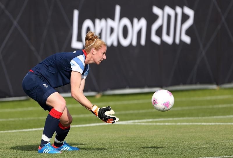 © Reuters. Team GB's Olympic women's soccer team goalkeeper Karen Bardsley catches the ball during a training session in Cardiff