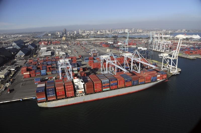 © Reuters. Ships gather off the port at Long Beach, California in this aerial image