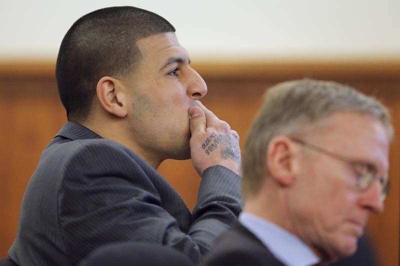 © Reuters. Former New England Patriots football player Hernandez and his attorney Rankin listen as prosecution witness Alexander Bradley is questioned at Bristol County Superior Court in Fall River
