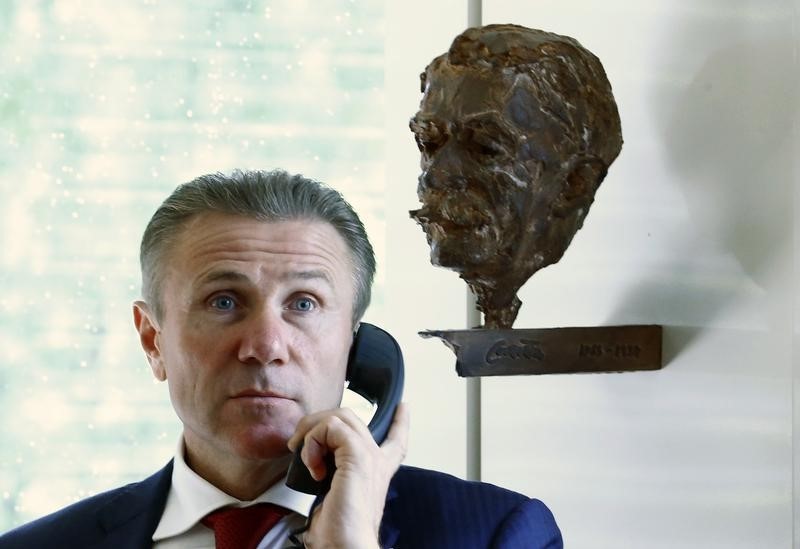 © Reuters. IOC member Bubka speaks on phone at the Executive Board meeting in Lausanne