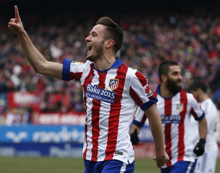 © Reuters. Atletico Madrid's Saul Niguez celebrates after scoring a goal during their Spanish first division soccer match in Madrid