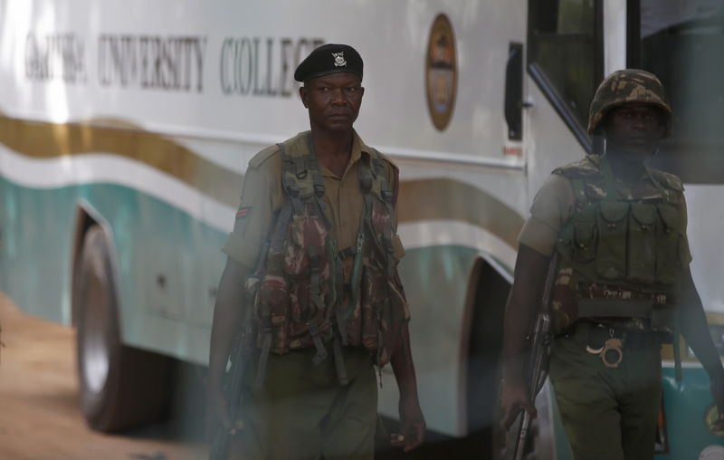 © Reuters. Kenya Administration policemen walk inside Garissa University College in Garissa 