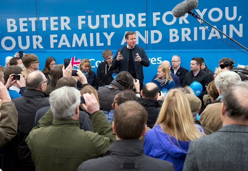 © Reuters. Britain's Prime Minister Cameron talks to supporters at Abingdon and Witney College in Abingdon, southern England