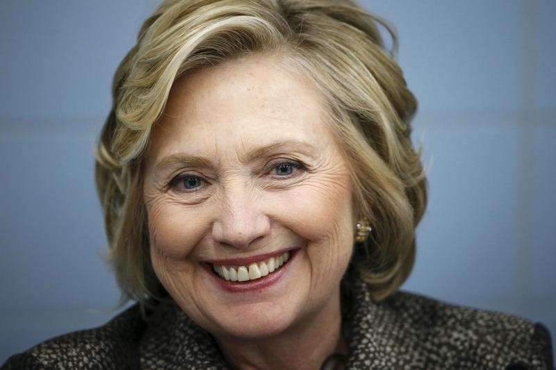 © Reuters. Former U.S. Secretary of State Clinton smiles as she attends the early childhood development initiative "talk to you baby" in Brooklyn, New York